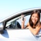 17 year old woman smiling showing new car keys