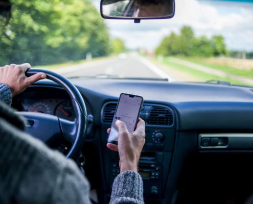 how much does texting while driving increase auto insurance premiums